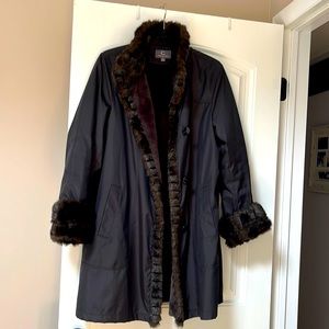 black trench coat. waterproof and extremely warm.